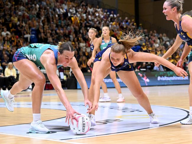 Emily Mannix and Steph Wood had a hard-fought battle in the Lightning’s goal circle. Picture: Bradley Kanaris/Getty Images