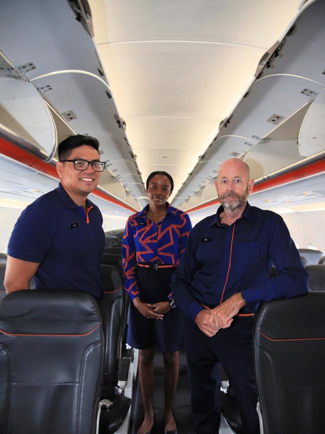 Jetstar cabin crew members Jonas Desiderio and Loyce Thorach and cabin crew manager Alby McDonald will celebrate International Cabin Crew Member Day in the sky on May 31. Picture: Catherine Duffy