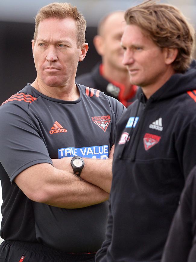 Robinson with James Hird at Essendon training.