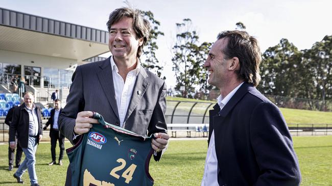 AFL CEO Gillon McLachlan and AFL CEO-elect Andrew Dillon with the Tasmania jersey at Dial Park, Penguin. Picture: Grant Viney