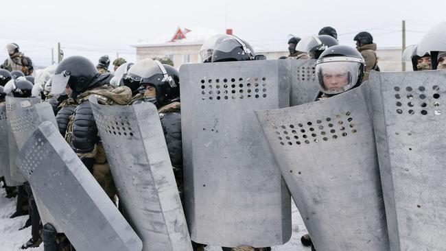 Riot police in Baymak, Russia disperse crowds protesting the sentencing of activist Fail Alsynov, jailed for campaigning against Urals gold mining and advocating Bashkir language rights. Picture: Anya Marchenkova/AFP