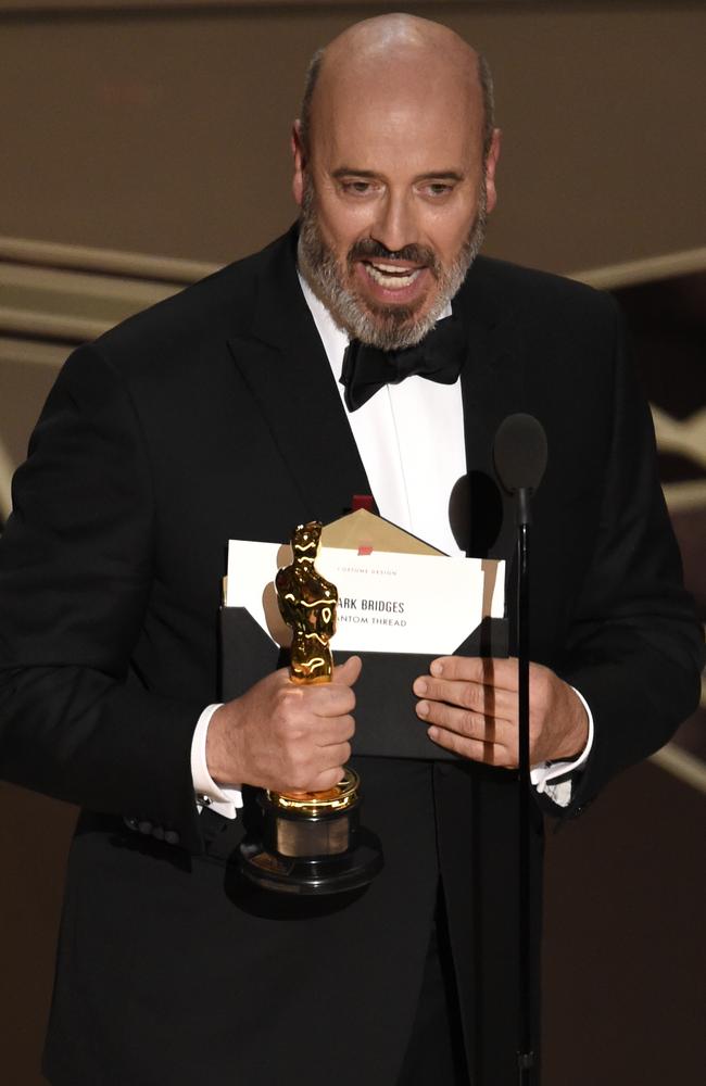 Mark Bridges accepts the award for best costume design for Phantom Thread. Picture: AP