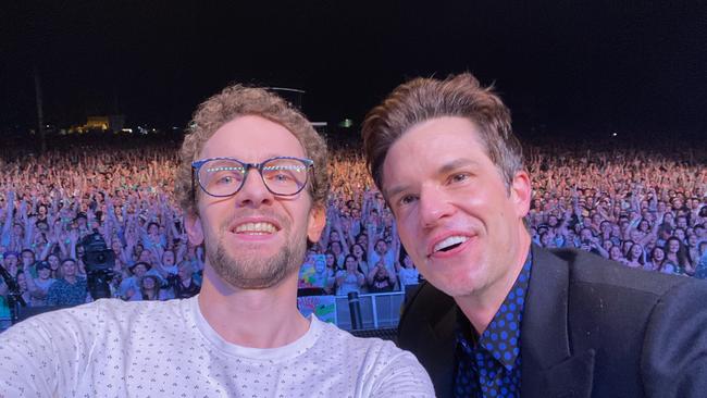 Andrew Clark on stage with The Killers Brandon Flowers at Day on the Green Saturday night. Picture: Supplied