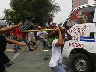 Police van rams anti-US protesters