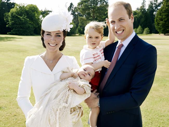 KING'S LYNN, ENGLAND - JULY 05: (EDITORIAL USE ONLY) In this handout image supplied by Mario Testino/ Art Partner, Catherine, Duchess of Cambridge, Prince William, Duke of Cambridge and their children Princess Charlotte of Cambridge and Prince George of Cambridge pose for a photo after the christening of Princess Charlotte of Cambridge at the Sandringham Estate on July 5, 2015 in King's Lynn, England. (Photo by Mario Testino/ Art Partner via Getty Images) ***Terms of release, which must be included and passed-on to anyone to whom this image is supplied: USE AFTER 10/10/2015 must be cleared by Art Partner. This photograph is for editorial use only. NO commercial use. NO use in calendars, books or supplements. Use on a cover, or for any other purpose, will require approval from Art Partner and the Kensington Palace Press Office. There is no charge for the supply, release or publication of this official photograph. This photograph must not be digitally enhanced, manipulated or modified and must be used substantially uncropped. Picture must be credited: copyright Mario Testino /Art Partner.***