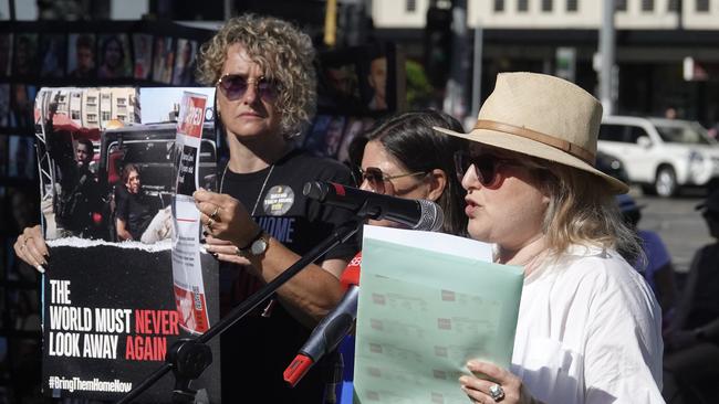 Nikki Perzuck (right) speaking at a #BringThemHomeNow event Caulfield Park, Victoria. Picture: NCA NewsWire/Valeriu Campan