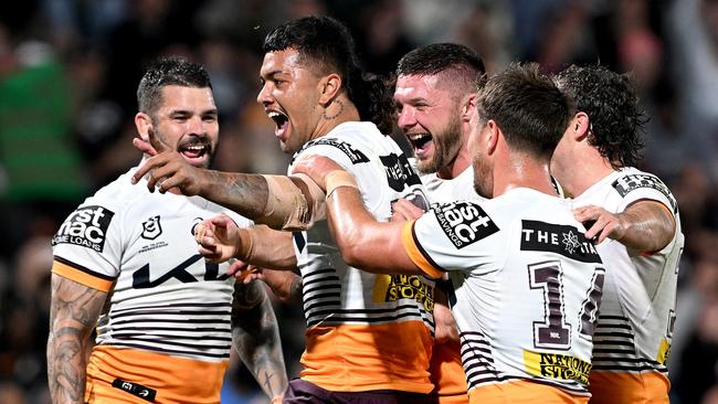 SUNSHINE COAST, AUSTRALIA - JULY 21: Xavier Willison of the Broncos celebrates after scoring a try during the round 21 NRL match between South Sydney Rabbitohs and Brisbane Broncos at Sunshine Coast Stadium on July 21, 2023 in Sunshine Coast, Australia. (Photo by Bradley Kanaris/Getty Images)