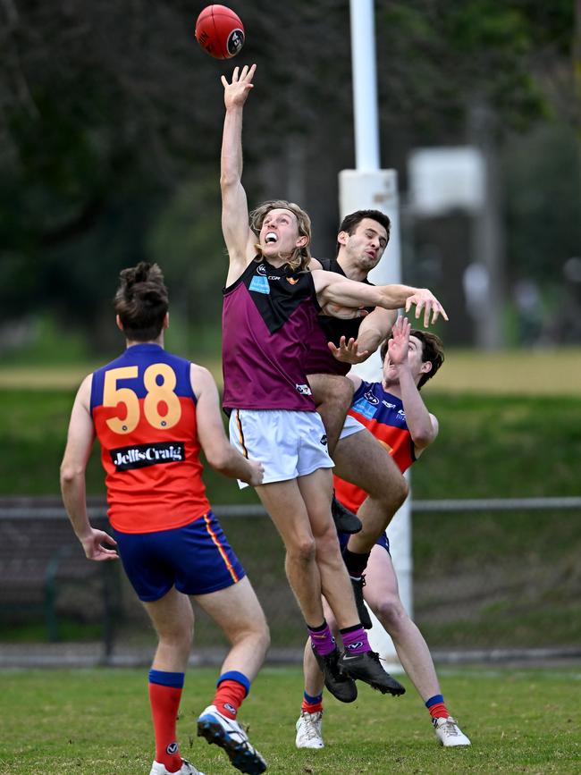 VAFA: Old Haileybury’s Jack Grenda stretches for the ball. Picture: Andy Brownbill