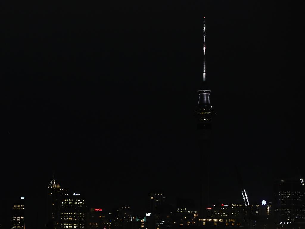 The Auckland Sky Tower illuminated in white is seen on December 10 in Auckland. Picture: Hannah Peters