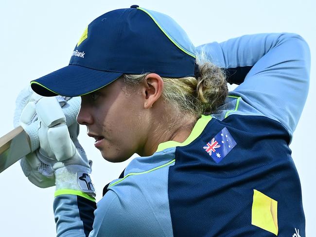 MACKAY, AUSTRALIA - SEPTEMBER 22: Phoebe Litchfield of Australia warms up ahead of game two of the Women's T20 International Series between Australia and New Zealand at Great Barrier Reef Arena on September 22, 2024 in Mackay, Australia. (Photo by Albert Perez/Getty Images)