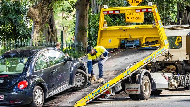 A car being towed from a clearway in Alice St in the CBD. Council will extend clearways in a low-cost bid to bust congestion. Picture: Richard Walker