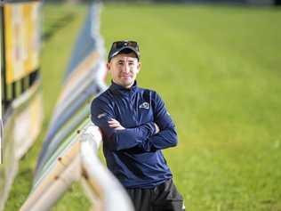 WORLD OF HIS OWN: Grafton-based jockey Matthew Paget, who will pilot Freddie Fox Trot in the Ramornie Handicap, checks out the track near the finish line at the Clarence River Jockey Club. Picture: Adam Hourigan