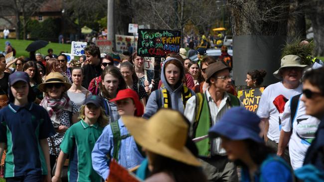 People are seen arriving to the Global Strike 4 Climate rally, Melbourne, Friday, September 20, 2019. Picture: James Ross/AAP.