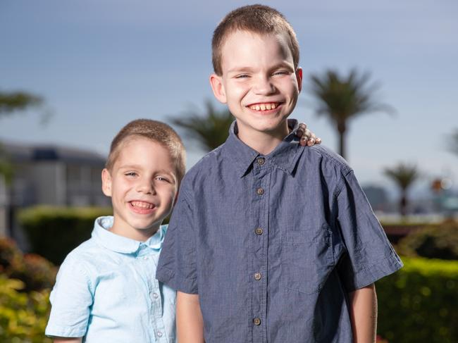 Brothers Jordan, 10, right, and Logan Weir, 7, suffer the same rare genetic condition but in a nonsensical twist one of them receives $100,000 a year more in support from the NDIS. Picture: Supplied