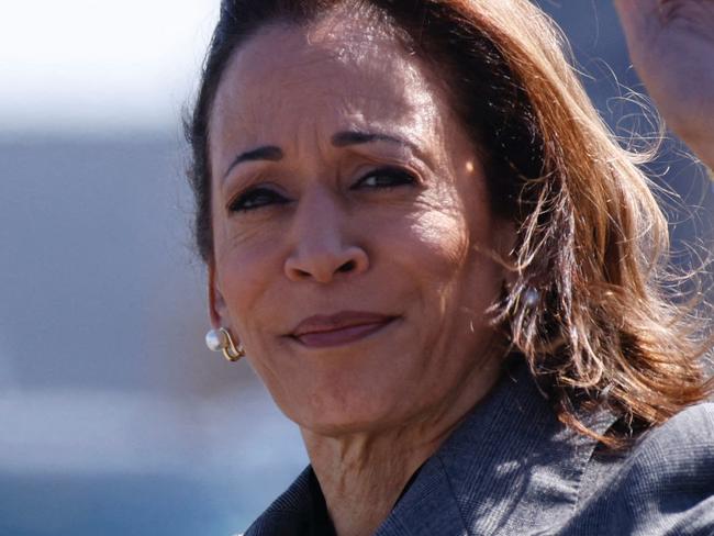 US Vice President and Democratic presidential candidate Kamala Harris steps off Air Force Two as she arrives at LaGuardia Airport in Queens, New York, September 22, 2024. Kamala Harris will attend a campaign fundraiser in New York. (Photo by Kena Betancur / AFP)