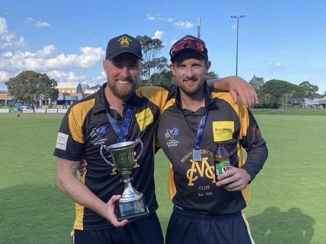 Simon Cormie (left) and Matthew Walker with the premiership cup.