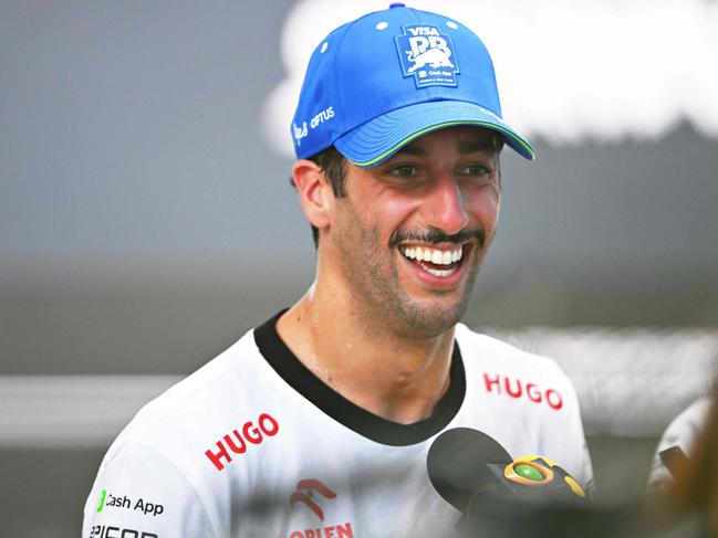 MIAMI, FLORIDA - MAY 04: 4th placed Daniel Ricciardo of Australia and Visa Cash App RB talks to the media in the Paddock after the Sprint ahead of the F1 Grand Prix of Miami at Miami International Autodrome on May 04, 2024 in Miami, Florida.   Rudy Carezzevoli/Getty Images/AFP (Photo by Rudy Carezzevoli / GETTY IMAGES NORTH AMERICA / Getty Images via AFP)