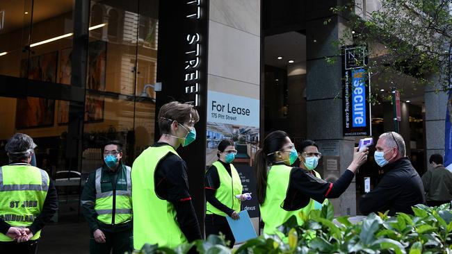 A man prepares to be vaccinated at the new COVID-19 vaccination hub in the Sydney CBD. Picture: NCA NewsWire/Bianca De Marchi.