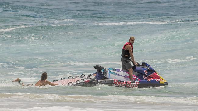 Mick Fanning on a jetski as surfers enjoy the larger than usual swell at Kirra Beach due to Tropical Cyclone Oma Picture: Jerad Williams