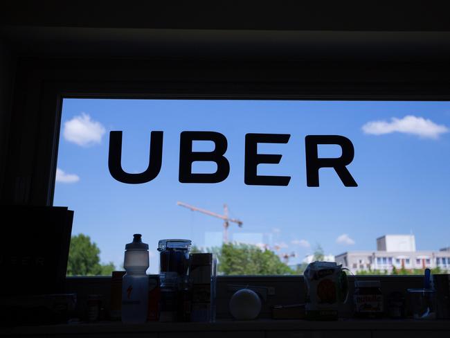 Uber’s commitment to what it views as clearing the way for the best and brightest has aided its rapid rise from a scrappy startup to one with a valuation of $68 billion. Above, the Uber logo on a window at its offices in Berlin. PHOTO: KRISZTIAN BOCSI/BLOOMBERG NEWS