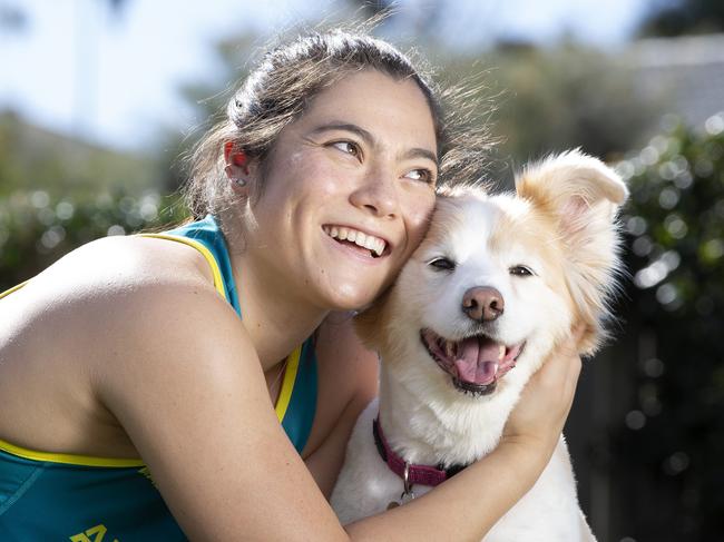 Gymnast Georgia Godwin has kept up her gymnastics training at her Manly West home with the help of her dog Rosie. 11.07.2020 Picture: Renae Droop