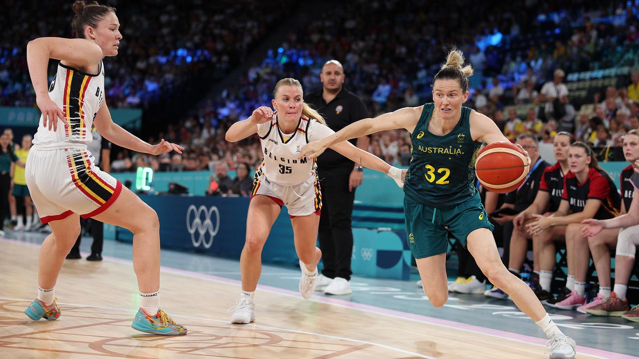 Sami Whitcomb #32 of Team Australia dribbles the ball against Julie Vanloo #35 of Team Belgium during the women's bronze medal game on August 1. Picture: Elsa/Getty Images