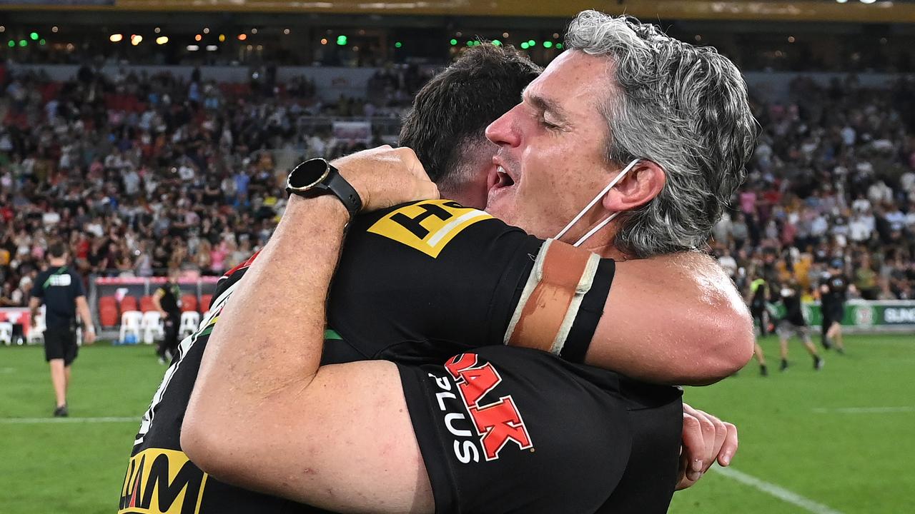 Ivan Cleary (right) and son Nathan Cleary celebrate after winning the 2021 NRL grand final (Photo by Bradley Kanaris/Getty Images)