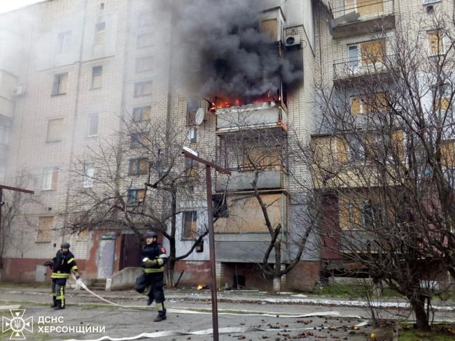 Firefighters put out a fire after a shell explosion in a residential building from a Russian shelling in Bilozerka village, Kherson region, amid Russian invasion in Ukraine. Picture: AFP