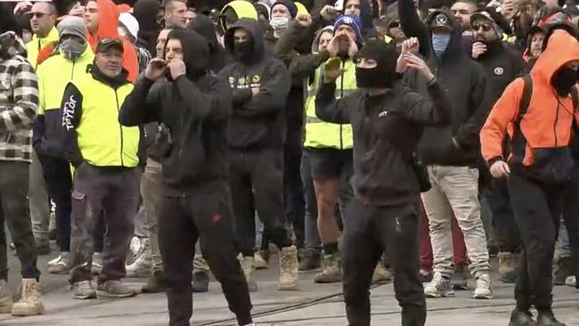 Crowds of construction workers gather outside CFMEU headquarters. Picture: Sky News