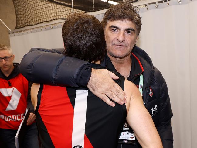 MELBOURNE, AUSTRALIA - APRIL 12: Andrew McGrath of the Bombers and Adrian Dodoro celebrate during the 2024 AFL Round 05 match between the Western Bulldogs and the Essendon Bombers at Marvel Stadium on April 12, 2024 in Melbourne, Australia. (Photo by Michael Willson/AFL Photos via Getty Images)