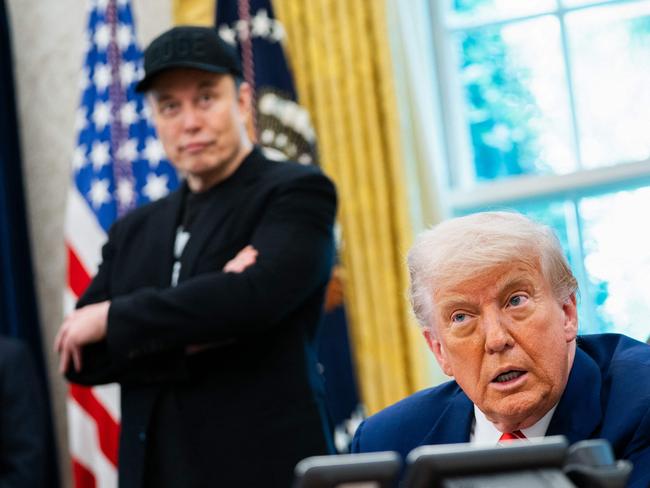 US President Donald Trump speaks during a news conference with Elon Musk (L) in the Oval Office of the White House in Washington, DC, on May 30, 2025. Musk, who stormed into US politics as President Trump's chainsaw-brandishing sidekick, announced on May 28 that he is leaving his role in US government, intended to reduce federal spending, shortly after his first major break with the President over Trump's signature spending bill. (Photo by Allison ROBBERT / AFP)