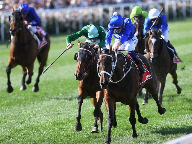 Winx holds off Humidor to win her third consecutive Cox Plate. Picture: AAP