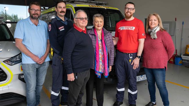 Brendan McDaid with wife Kathy, son Peter and daughter-in-law Lisa thanked paramedics Chris Wilkinson and Michael Walker for saving his life after he went into cardiac arrest a year ago. Picture: Brad Fleet