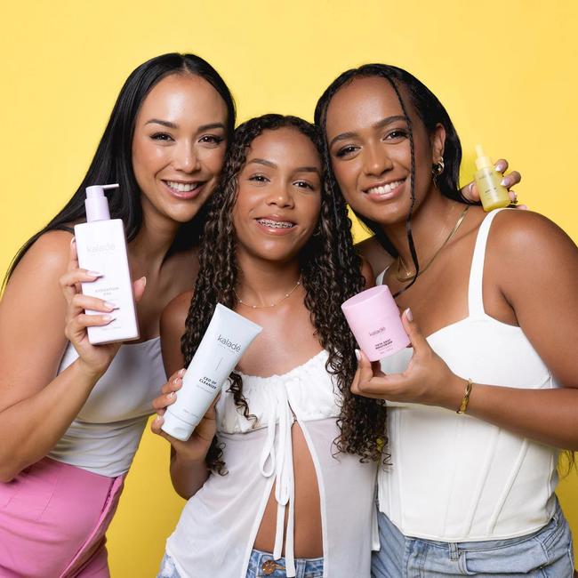 Kat Clark with daughters Deja, 14 and Latisha, 21 promoting their skin care brand 'Kalade'. Photo: Supplied.