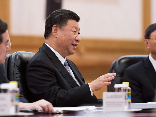 China's President Xi Jinping (C) speaks with Senegal's President Macky Sall (not pictured) during their bilateral meeting at the Great Hall of the People in Beijing on September 2, 2018. - Sall is in China for the Forum on China-Africa Cooperation on September 3-4 in Beijing. (Photo by Nicolas ASFOURI / POOL / AFP)