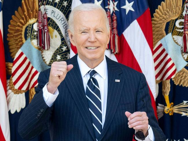 US President Joe Biden gestures during an event about the presidential election results in the Rose Garden of the White House in Washington, DC, November 7, 2024. US President Joe Biden urged Americans Thursday to lower the political temperature after Donald Trump's sweeping election win, saying he would ensure a "peaceful and orderly" transition to the Republican. (Photo by SAUL LOEB / AFP)