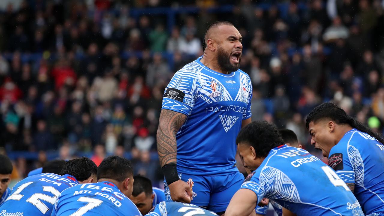 Junior Paulo of Samoa leads the Siva Tau during the Rugby League World Cup Quarter Final match between Tonga and Samoa at The Halliwell Jones Stadium on November 06, 2022 in Warrington, England. (Photo by Jan Kruger/Getty Images for RLWC)