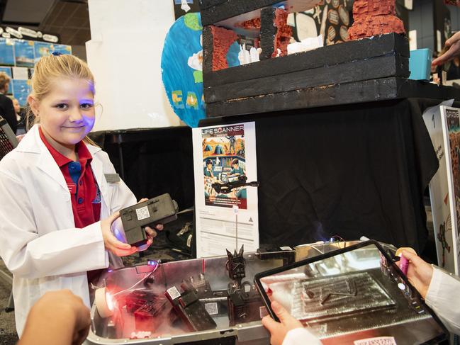 Vale View State School student Sophia Scheid with the teams life scanners for Mars display as part of Kids in Space Queensland finals and showcase at Edmund Rice Cultural Centre St Mary's College, Friday, June 7, 2024. Picture: Kevin Farmer