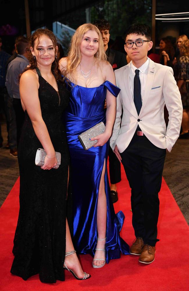 Charlotte, Haylee and Marcus at Caloundra State High School formal. Picture: Patrick Woods.