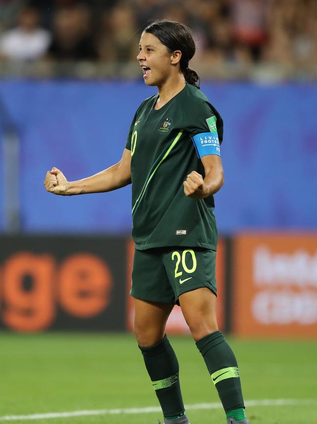 GRENOBLE, FRANCE - JUNE 18: Sam Kerr of Australia celebrates after scoring her team's fourth goal during the 2019 FIFA Women's World Cup France group C match between Jamaica and Australia at Stade des Alpes on June 18, 2019 in Grenoble, France. (Photo by Elsa/Getty Images)