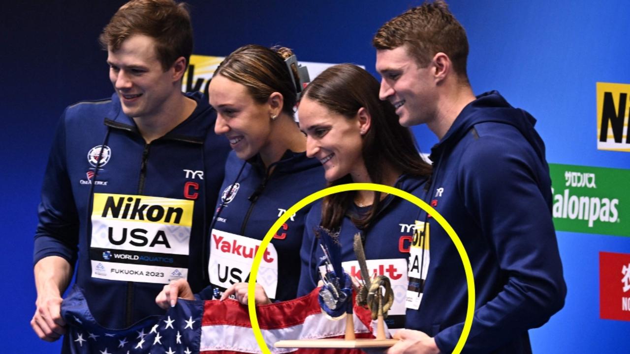 It should have been Australia holding this trophy. (Photo by Philip FONG / AFP)`