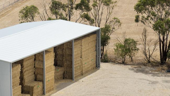 Hay sheds across Victoria and NSW are full, as demand is low. Picture: ZOE PHILLIPS