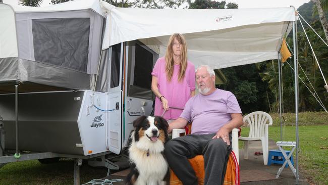 Caravanning tourists Oriel and Peter Glennen with pet dog Zephyr from Port Fairy in Victoria had their Jeep Grand Cherokee stolen from under their noses at Port Douglas on Saturday, July 27 and now have no way to get home. Picture: Peter Carruthers