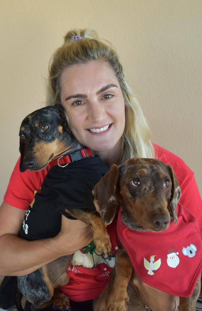 Chane Brits, of Bucasia with Pepper and Coco at the Mackay Dachshund Christmas Party. Photo: Janessa Ekert