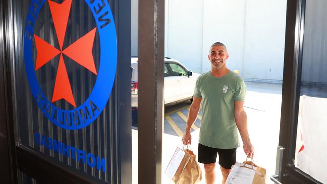 The Shed cafe Parramatta owner Sam Georges delivers meals to the Northmead NSW Ambulance superstation. Picture: Angelo Velardo