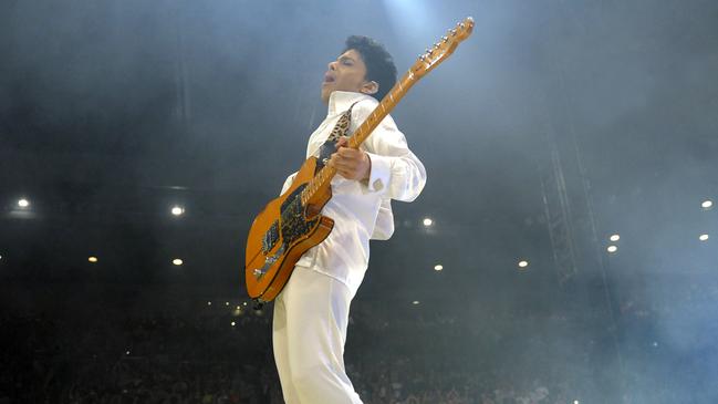 Prince performing in concert at Rod Laver Arena.