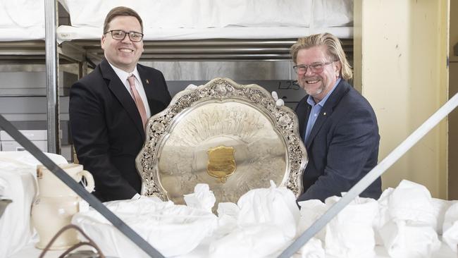 The State Government has committed $250k for a plan for a new museum of SA history. Education Minister John Gardner with History Trust CEO Greg Mackie with some artefacts. Picture Simon Cross