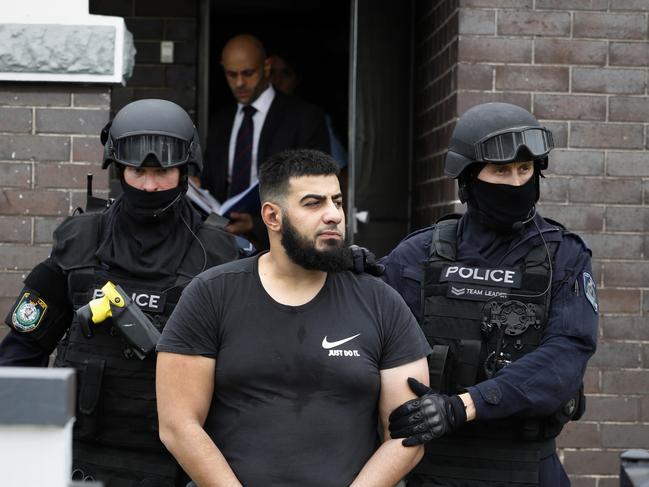 Omar Fawaz Mahfouz, then 27, is arrested at his Bankstown home on Friday March 22, 2019.