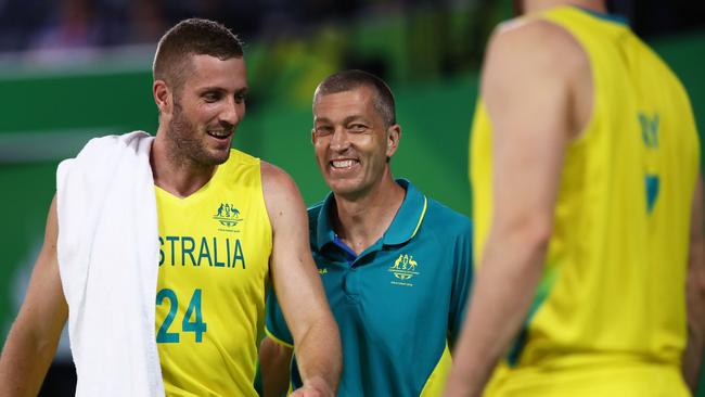 Boomers coach Andrej Lemanis (centre) smiles during his team’s preliminary round victory over Nigeria on Monday. Photo: Getty Images