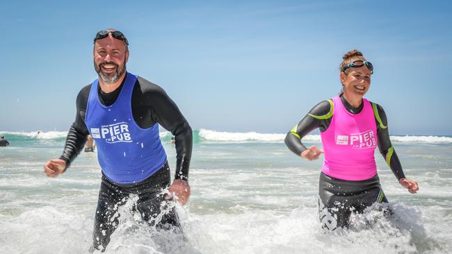 Former treasurer Josh Frydenberg has not nominated to contest Kooyong. He and wife Amie competed in the Lorne Pier to Pub swim last weekend. Picture: Mark Dadswell